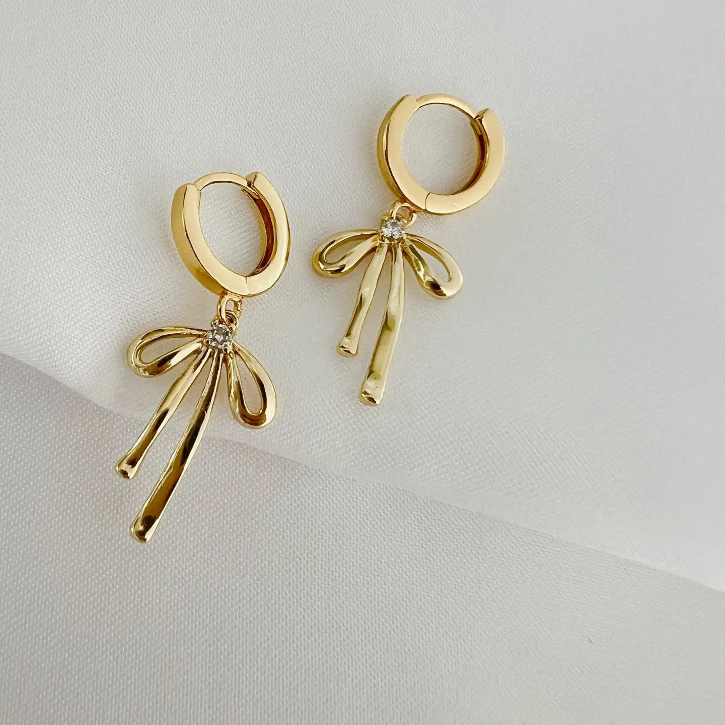 Bow Huggie Hoops | Gold Filled