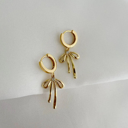 Bow Huggie Hoops | Gold Filled